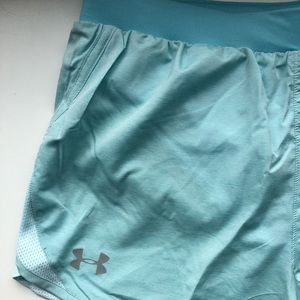 Under Armour running shorts, size medium